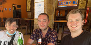 English tourist Fraser James,left,with backpacking friends on Khaosan Road.