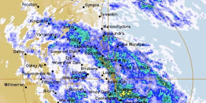 SEQ cops all-day drenching while western rivers see highest peaks in 10 years