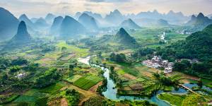 China is surprisingly great for outdoor adventure. You can explore the famous humped landscapes and rivers around sub-tropical Guilin.