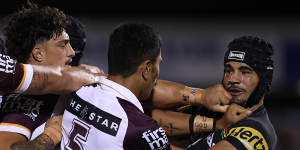 Taylan May gets into a scuffle during the Panthers’ big win over Brisbane