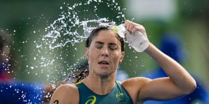 Ashleigh Gentle of Australia cools off during the mixed relay triathlon in Tokyo.