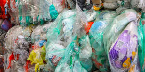 Plastic bags stockpiled in Sydney warehouses. Nearly 12,400 tonnes of soft plastics have now been located in 32 locations across the three states.