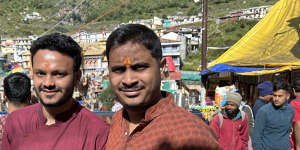 Medical manufacturing firm worker Atharv Gaikwad,26,and his friend,lawyer Kaivalya Jarande,also 26,outside Badrinath temple.