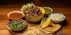 Taco platter with lamb barbacoa.