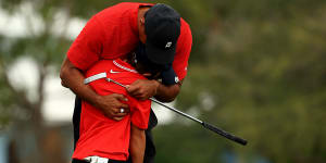 'It was unbelievable':Tiger brings his cub to the course