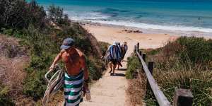 Swimmers enjoy the sunshine at Culburra beach.