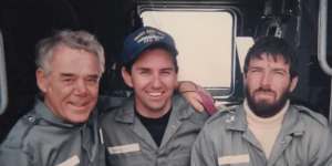 Gary Adshead aboard HMAS Adelaide with Tony Bullimore,left,and Thierry Dubois in 1997.