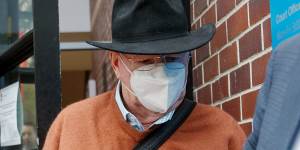 Retired Sydney priest Guy Hartcher arrives at Burwood Local Court 