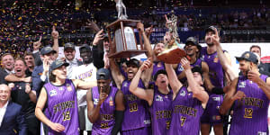 Sydney Kings players celebrate their series win over New Zealand Breakers.