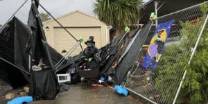 Storm levels Halloween House display at Wanniassa