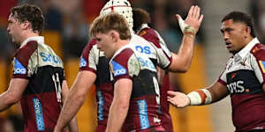 Richie Asiata (right) scored his fifth try in six games for the Reds,but it wasn’t quite enough. 
