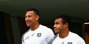 LONDON,ENGLAND - OCTOBER 30:Australia players Will Genia (r) and Israel Folau share a joke as they make their onto the field during the Australia Captain’s Run ahead of the World Cup Final at Twickenham on October 30,2015 in London,United Kingdom. (Photo by Stu Forster/Getty Images) ...