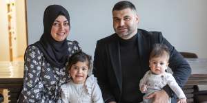 Zeyneb Gokler and Abdullah Altintop with their children Safiye,4,and six-month-old Salih.