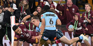 Queensland thrash NSW to seal Origin series after two send-offs for brawl