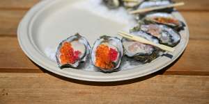 A selection of oysters dressed with Yarra Valley caviar and finger lime;mignonette;nam jim;and natural.