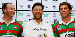 Russell Crowe,centre,didn’t want Souths to be beholden to poker machines.