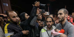 A Palestinian baby injured in Israeli airstrikes is brought to Nasser Medical Hospital in Khan Younis.