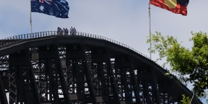 The Aboriginal flag flew alongside the Australian flag on the Sydney Harbour Bridge for the first time on Australia Day of 2013.