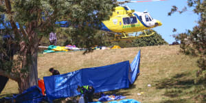 A helicopter ambulance at the site of the jumping castle tragedy in Devonport,in December 2021. 