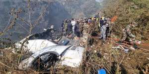 Rescue teams working at the wreckage of a Yeti Airlines ATR72 aircraft after it crashed in Pokhara,Nepal,
