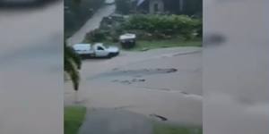 Heavy rain and high wind lashes North Queensland as the remnants of the former cyclone Koji hammer the coast.