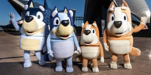 The cast of Bluey’s Big Play poses at the Sydney Opera House.
