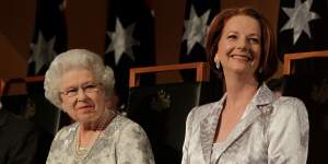 The Queen accompanied by former Australian prime minister Julia Gillard in 2011.