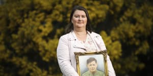 Jenni Rickard,of the Australian Parents Council,with a photo of her soldier grandfather