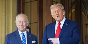 FILE - President Donald Trump gestures next to Britain's King Charles III before leaving Windsor Castle,Windsor,England,Sept. 18,2025. (AP Photo/Evan Vucci,file)