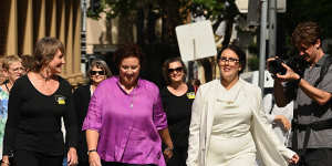 Kathleen Folbigg,centre,Tracy Chapman,left,and her lawyer Rhanee Rego outside the NSW Supreme Court in Sydney.