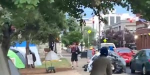 Video posted on social media appeared to show a man opening fire into Jefferson Square Park as people scrambled for cover. 