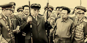 Kim Il-sung inspects North Korean army assault rifles watched by his son,Kim Jong-il (right),in 1975.
