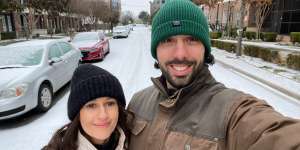Australian expats Emilia and Daniel Carrasco were excited to see snow for the first time before their power went down. 