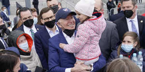 President Joe Biden meets with Ukrainian refugees during a visit to PGE Narodowy Stadium in Poland.