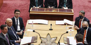Maskless Opposition Leader Peter Dutton and a masked Prime Minister Anthony Albanese in the Senate.