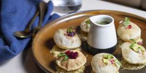 Golgappa filled with potato and green chilli and served with tamarind dressing.