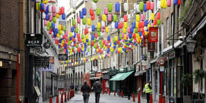 People walk through a quiet Chinatown in London. A review of the British government’s foreign policy advocates for more Chinese investment in the UK.