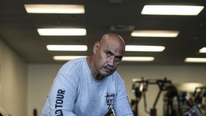 Flight attendant Fuzzy Maiava was slammed into the aircraft's ceiling during the nosedives. He relies on visits to the gym to cope with his physical and psychological injuries. 