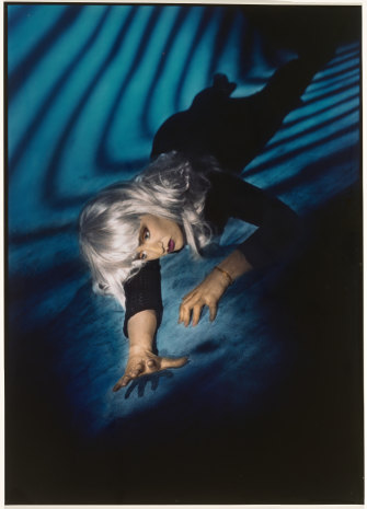 Robyn Stacey, Untitled (Girl in blond wig on floor), 1985