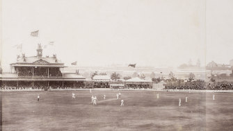 Amazingly, the Australian Star’s photographer captures a blurry Englishman chasing what looks like another sweep to the boundary. Stoddart has set a defensive field with just one slip and several defending the immaculately white picket fence. The SCG’s clock has featured in so many iconic photos. Think Steve Waugh’s famous final-ball century, Shane Warne’s record-breaking wicket. The clock hadn’t even been installed in 1894, but the Test ending was equally historic.