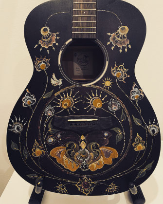 Hand painted guitar by Kate Ceberano