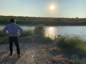 Laredo resident and lawyer Carlos Flores  overlooking the Rio Grande river.