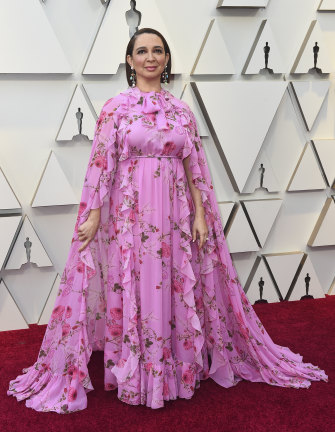 Rudolph in the pink floral Giambattista Valli caped gown at the 2019 Oscars.