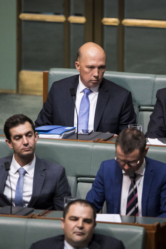 Peter Dutton on the backbench in Question Time. 