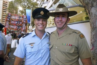 Afghanistan veterans Corporal Neal Fischer, Royal Australian Air Force, left, and Private Brychan Hawker, Australian Army, at the 2013 Mardi Gras parade.