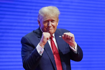 Donald Trump acknowledges the crowd support after speaking at the Conservative Political Action Conference (CPAC) in Florida.