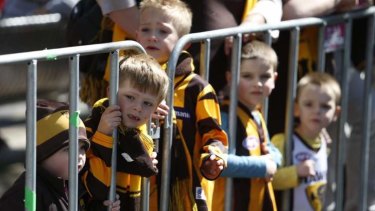 Young Hawks fans at the AFL Grand Final parade.