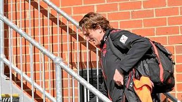 Essendon coach James Hird arrives at Windy Hill this afternoon.