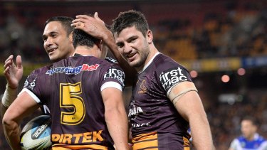 BRISBANE, AUSTRALIA - JUNE 26: Lachlan Maranta of the Broncos celebrates with team mates after scoring a try during the round 16 NRL match between the Brisbane Broncos and the Newcastle Knights at Suncorp Stadium on June 26, 2015 in Brisbane, Australia.  (Photo by Bradley Kanaris/Getty Images)