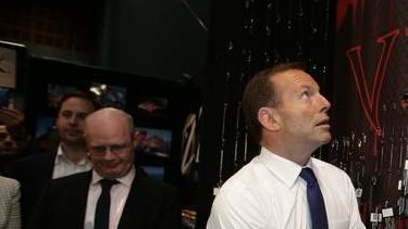 Opposition leader Tony Abbott visits the Australian Fishing Trade Show on the Gold Coast, Queensland, on Monday.